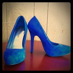 Royal blue suede pumps.