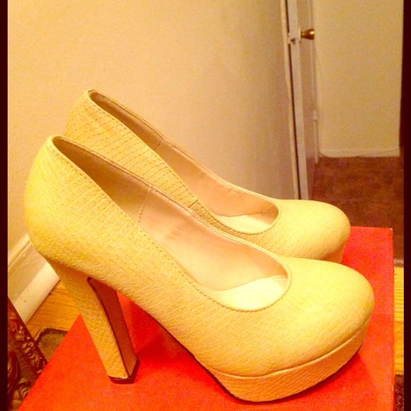 nude snake skin pumps