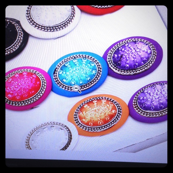 Adjustable oval colored center stone ring