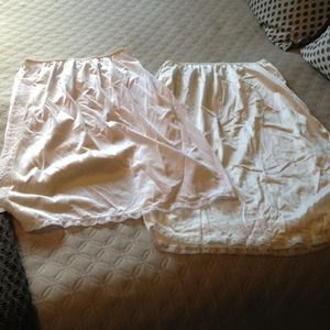 Two pretty white slip skirts