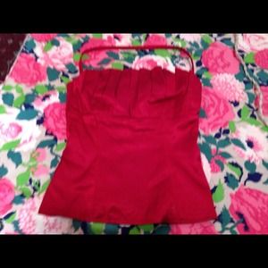 Red corset top by bebe