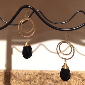 Gorgeous gold circle earrings with black pendants