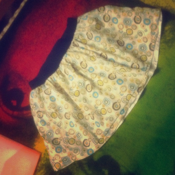 Skirt with blue,orange,green,brown circles on it