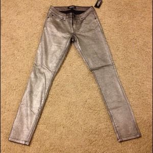 Metallic silver skinny jeans - size 25