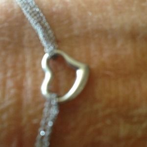 10kt white gold floating heart. One left