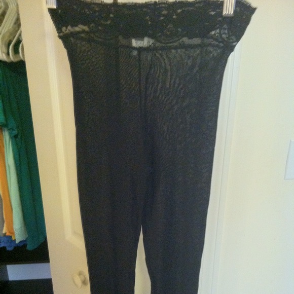 Sheer black leggings with lace on top and bottom