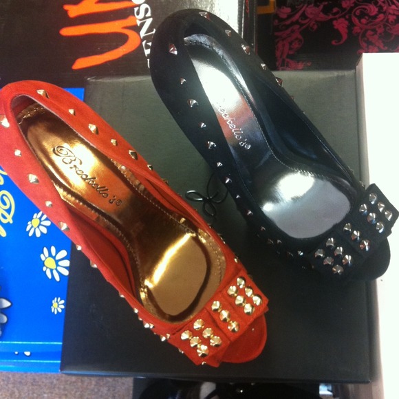 Black and orange studded heels