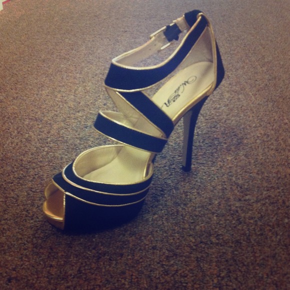 Brand new black and gold strap heels