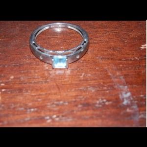 Ring with inspired aquamarine stone.