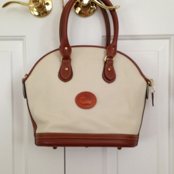 Dooney & Bourke creme purse with brown trim