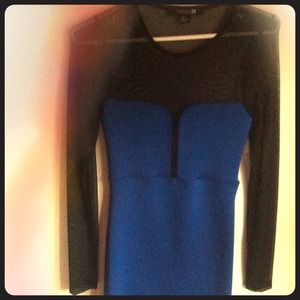 Navy blue dress with mesh sleeves.