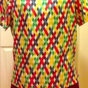 100% silk. Colorful and classy