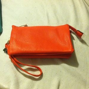 Blue and orange clutch/side bag .