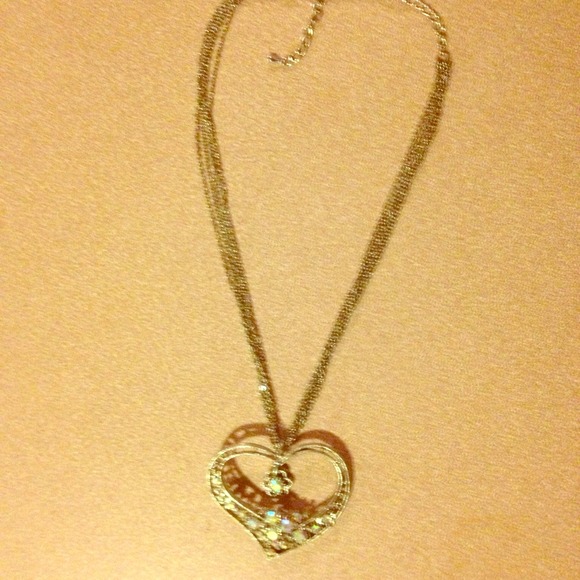 Heart shaped necklace with diamonds.