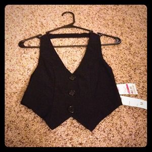 Black vest.