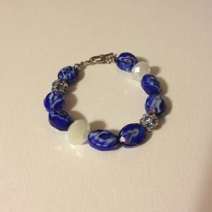 Blue and white bracelet with silver sparkle beads.