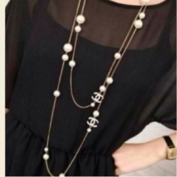 Jewelry - Long designer necklace with pearls and cc logo