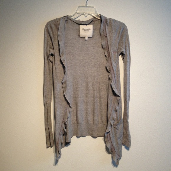 Gray cardigan with ruffle detail and pockets