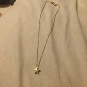 Dogeared star charm necklace.