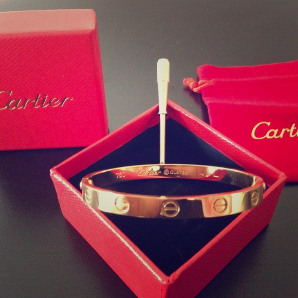 Gold tone screw bangle bracelet