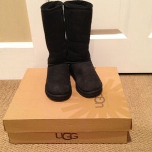 Tall black UGG boots