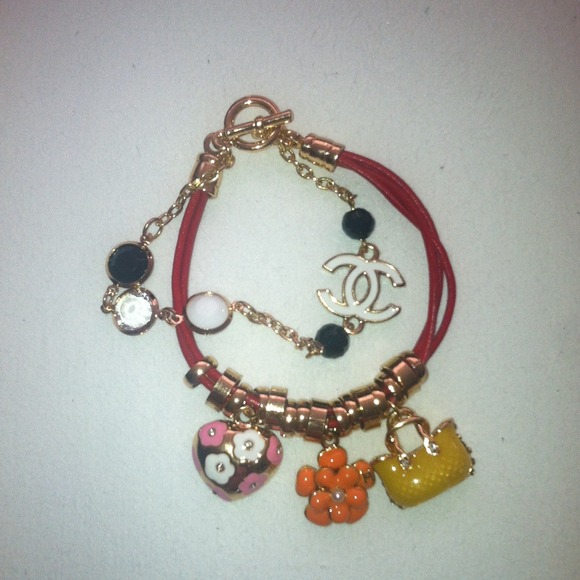 CHANEL Jewelry - CC logo bracelet with charms