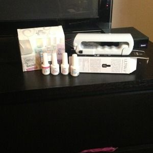 Gelish nail polish set and UV LIGHT and earrings