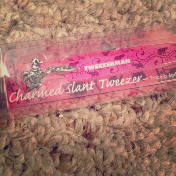 Brand new Tweezerman pink charmed slant tweezers!