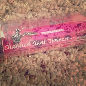 Brand new Tweezerman pink charmed slant tweezers!