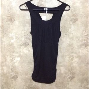 Sold BNWT-black tunic with cutout back