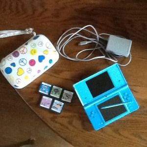 Dsi,charger,case,and five games *RESERVED*