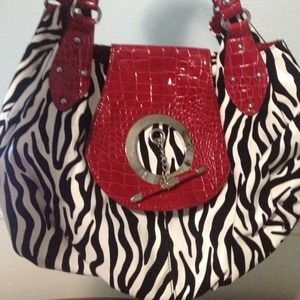 🎉REDUCED🎉Red zebra purse. Never used.