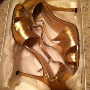 Manolo Blahnik gold strappy heals