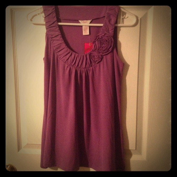 Loose fitting tank top.