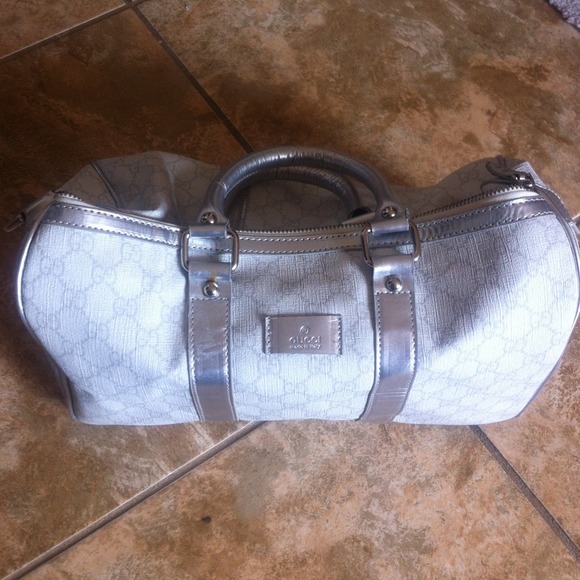 White off with silver lining speedy style bag