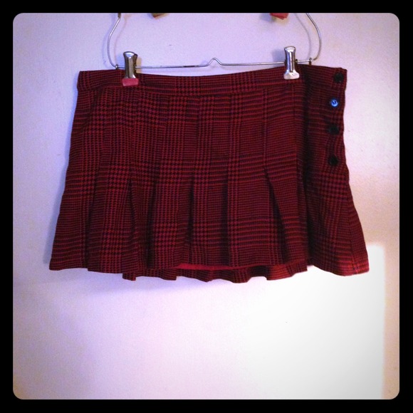 Red and black pleated skirt