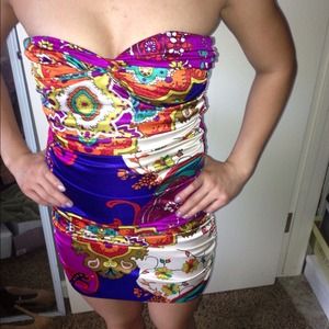 Cute tight fit it flora dress for a night wear.