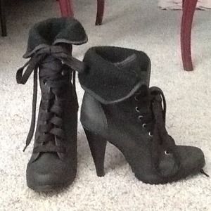 Black combat high heel boots