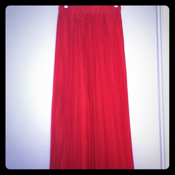 Red pleated maxi skirt