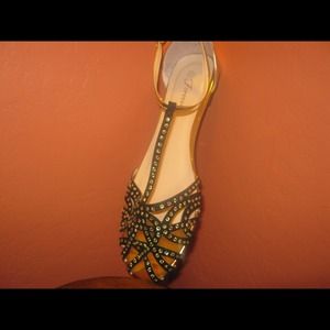 Black and gold shoes.