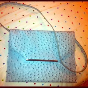 Baby blue dotted purse (converts into a clutch).