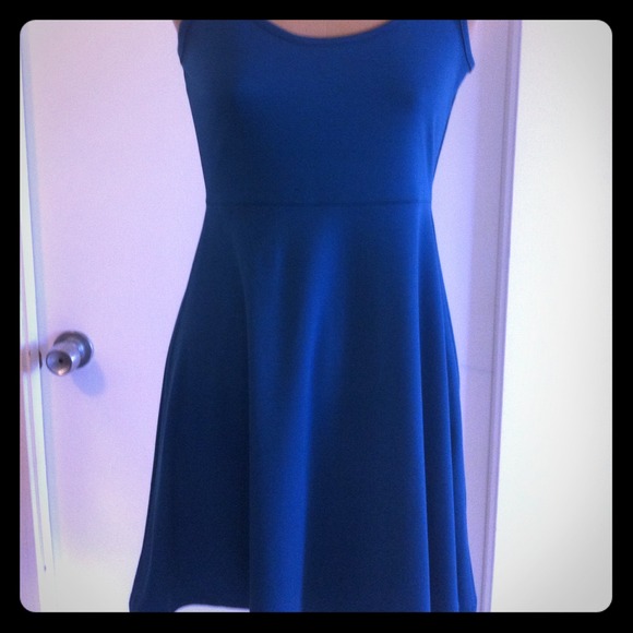 Teal tank dress hugs in all the right places