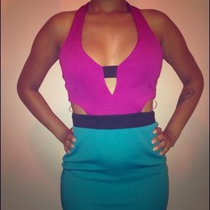 Magenta/Raspberry Dress. Never worn. Snug fit.