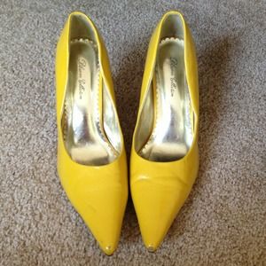 Yellow high heels