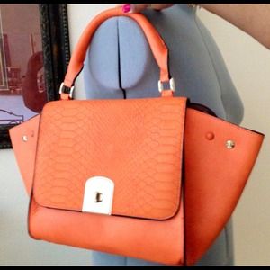 Shoe Dazzle orange faux leather bag