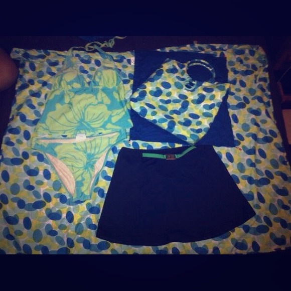 Swimsuit 2 pieces with a bag and a little skirt