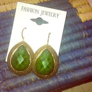 Leafy green earrings with a gold oval rim