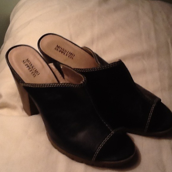 Black slides with white stitching