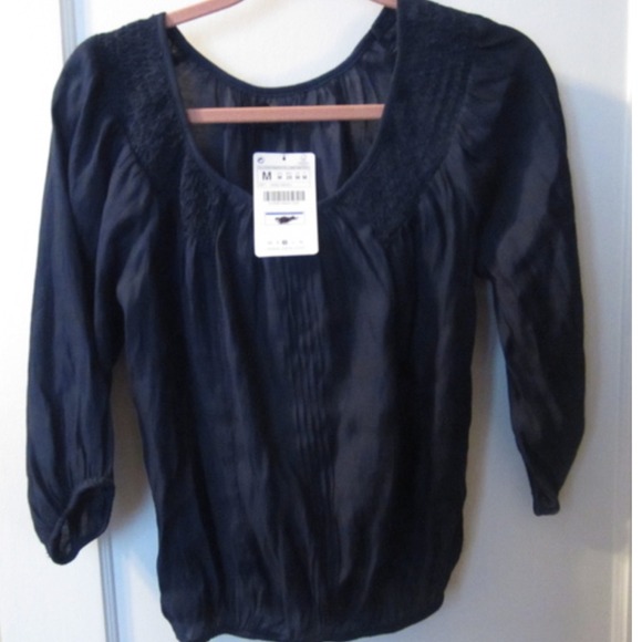 Peasant top with woven detail shoulders