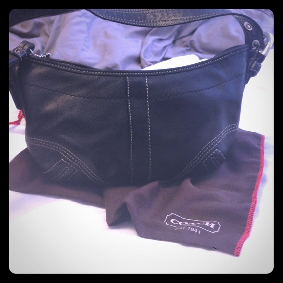 Reduced!!! Coach Soho, black leather with tassel.